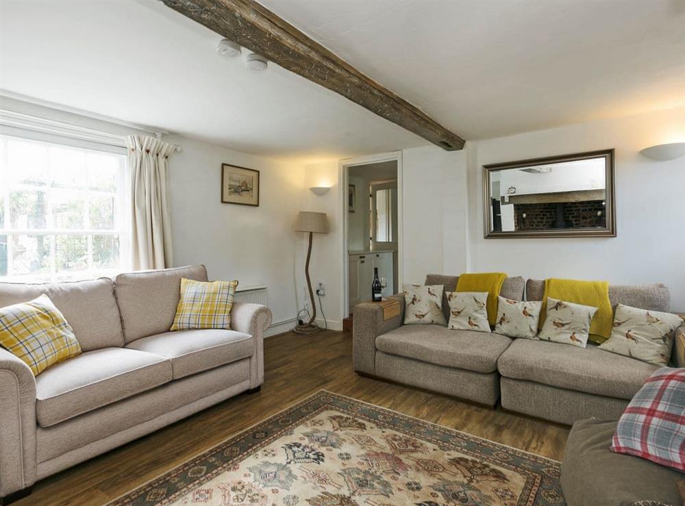 Warm and welcoming living room (photo 3) at Jennis Cottage in Aylsham, Norfolk