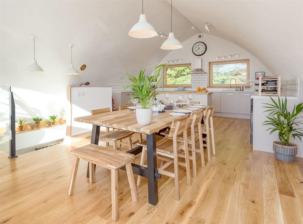 Convenient dining area within the open-plan living space at Jill Strawbale House in Strontian, near Fort William, Highlands, Argyll