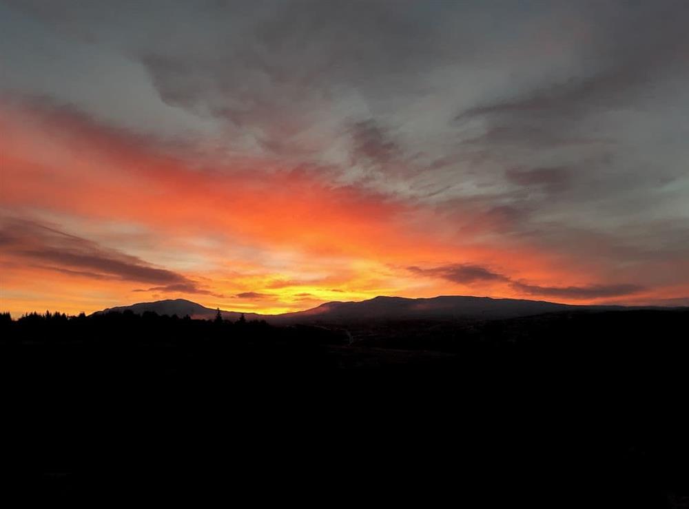 Spectacular sunsets can be enjoyed from the property at Jill Strawbale House in Strontian, near Fort William, Highlands, Argyll
