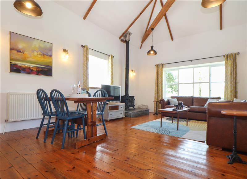 Relax in the living area at Joes Barn, Mullion