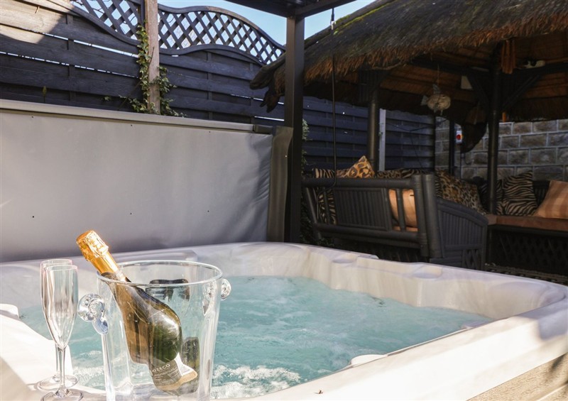 Enjoy the hot tub at Johns Cottage, Hampsthwaite