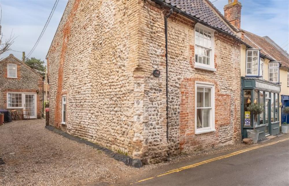 The cottage sits tucked away off the High Street, a stone’s throw from the Deli at Jollyboat Cottage, Blakeney near Holt