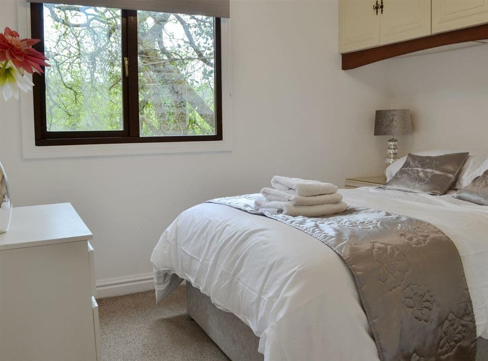 Comfortable double bedroom at Josnor Chalet in Benllech, Anglesey, Gwynedd