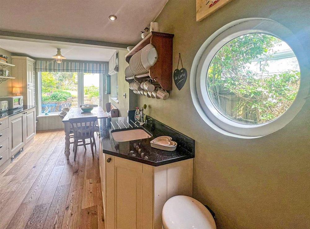 Kitchen at Joyful Cottage in Lymington, Hampshire
