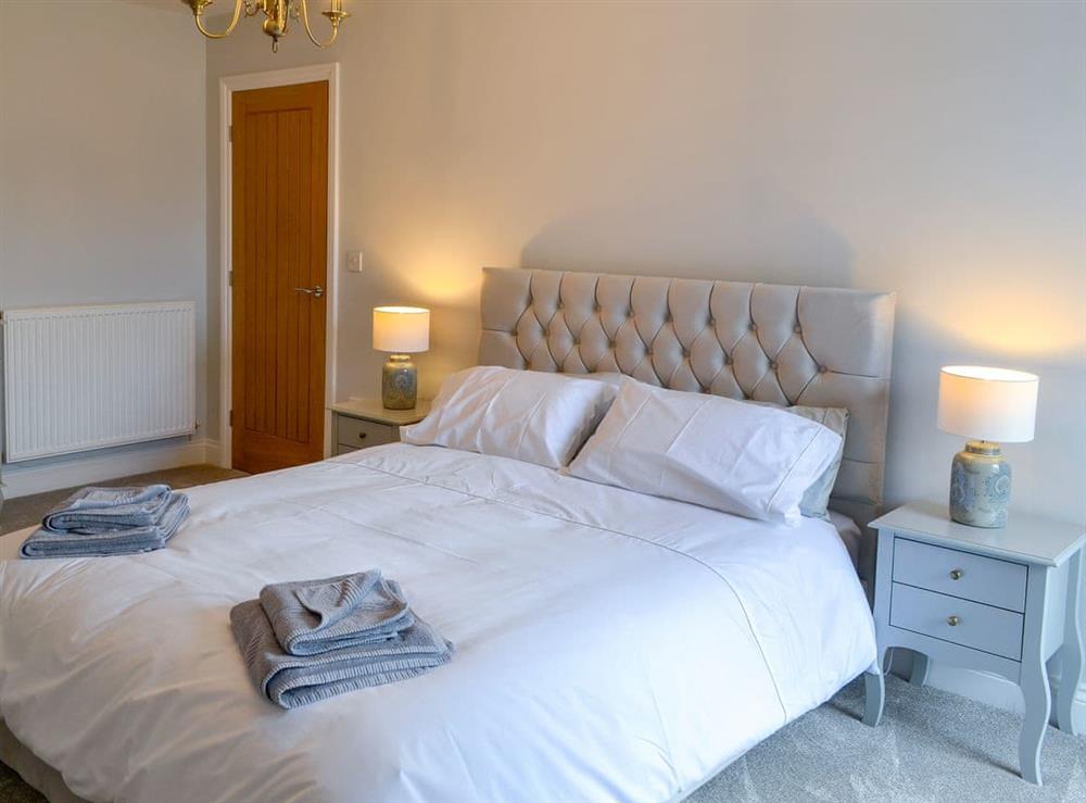 Comfortable bedroom with kingsize bed at Jubilee House in Alnwick, Northumberland