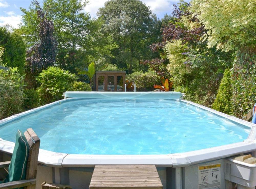 Shared heated open-air swimming pool at Judd House in Polson, Launceston, Cornwall