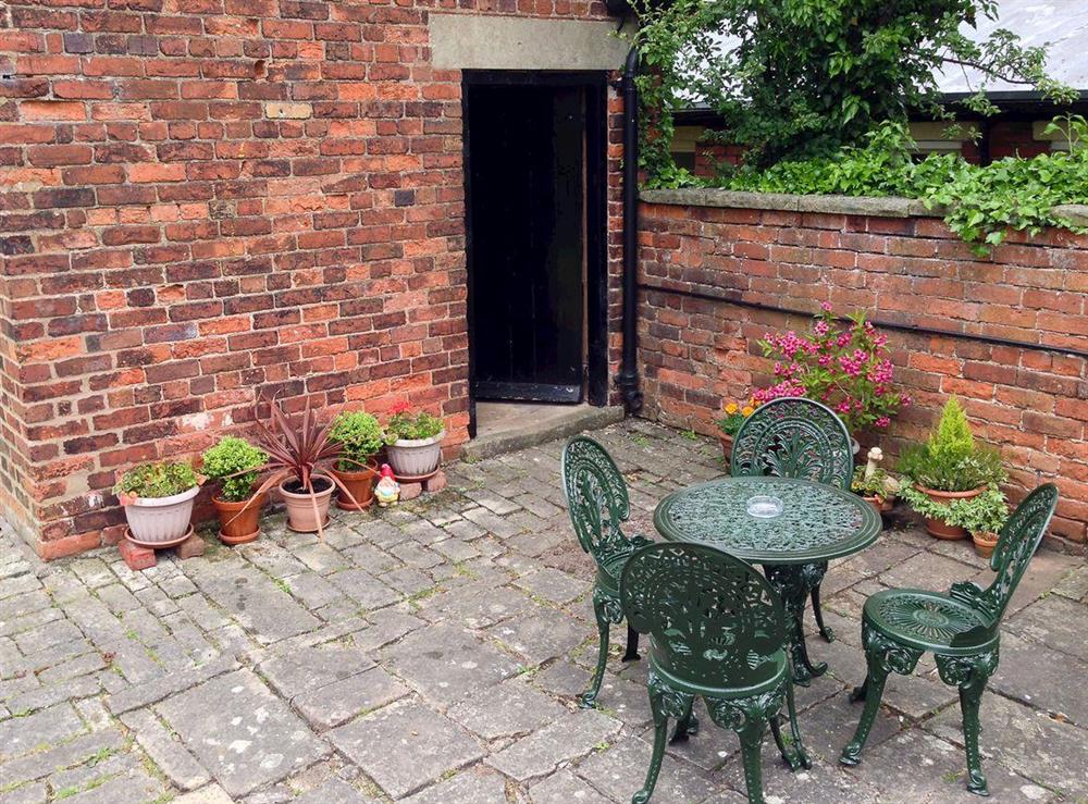 Patio at Jug and Glass Cottage in Nether Langwith, near Mansfield, Nottinghamshire