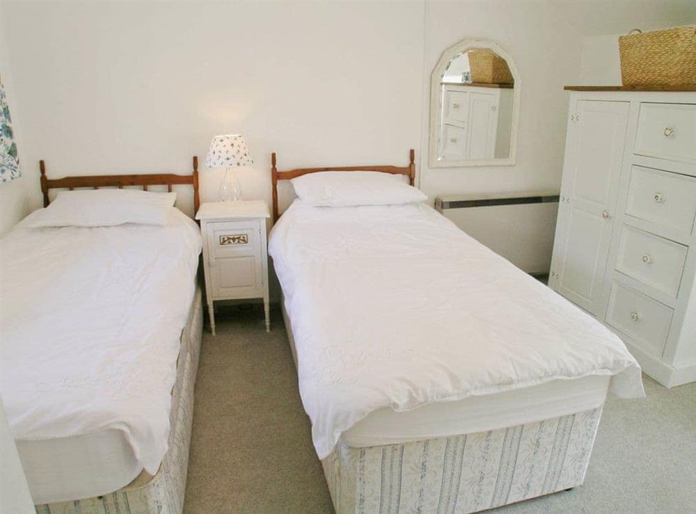 Twin bedroom at Junipers in Puncknowle, near Bridport, Dorset
