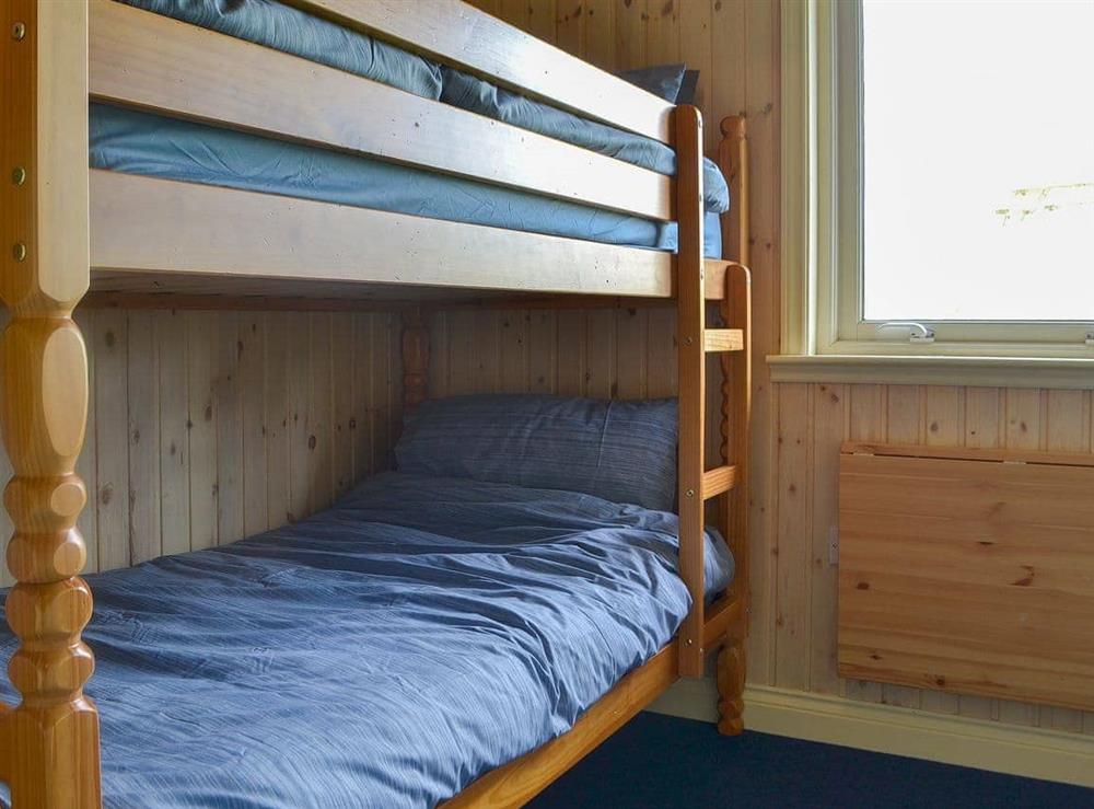Children’s bunk-bedded room at Kaptains Cabin in Yanwath, near Penrith, Cumbria