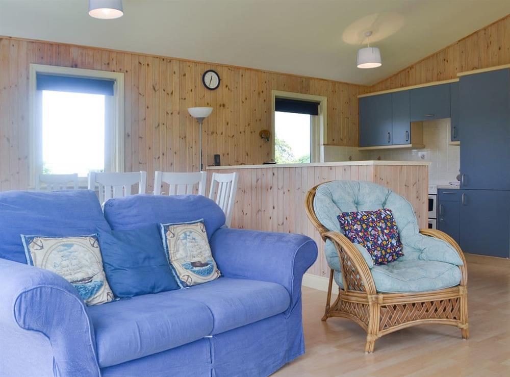 Warm and welcoming living area at Kaptains Cabin in Yanwath, near Penrith, Cumbria