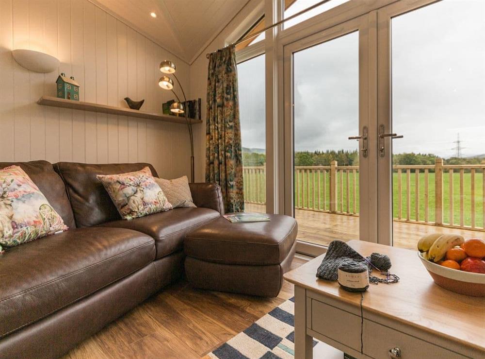 Comfortable seating within living area at Karelia Lodge in Keltyneyburn, near Aberfeldy, Perthshire