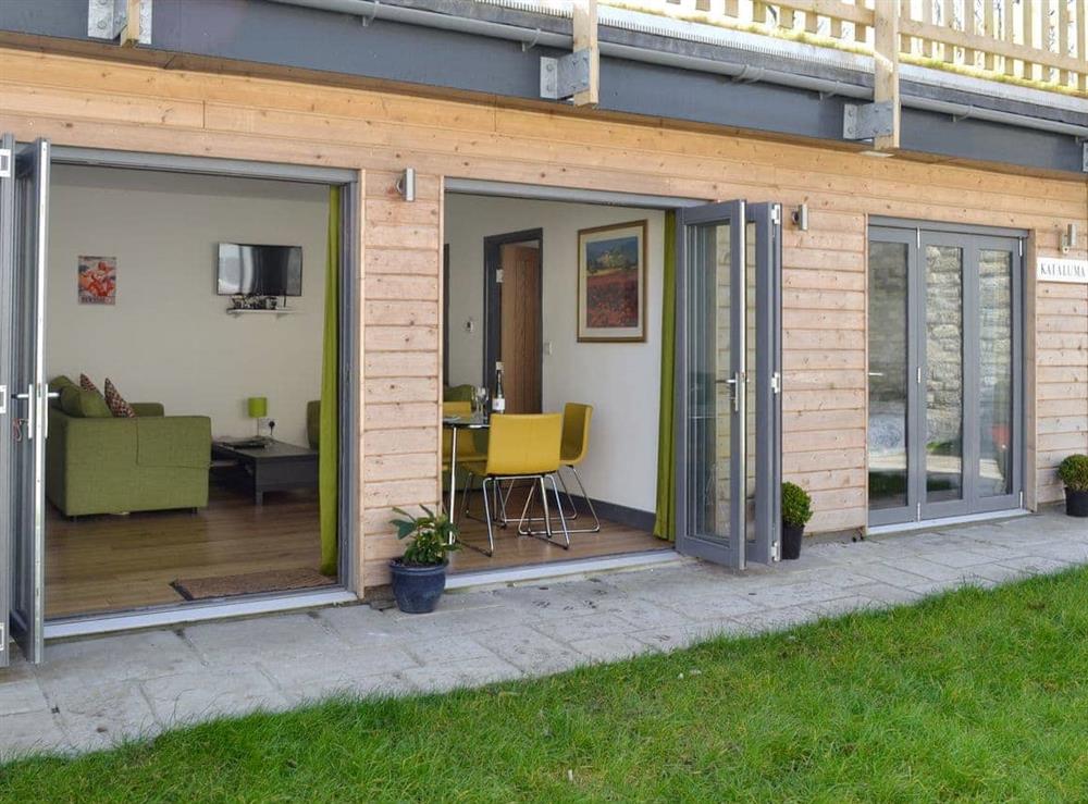 Folding doors offer easy access to the courtyard