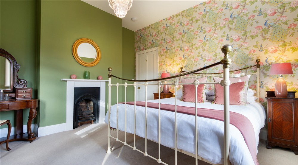 One of the double bedrooms at Kedleston Park House in Derby, Derbyshire