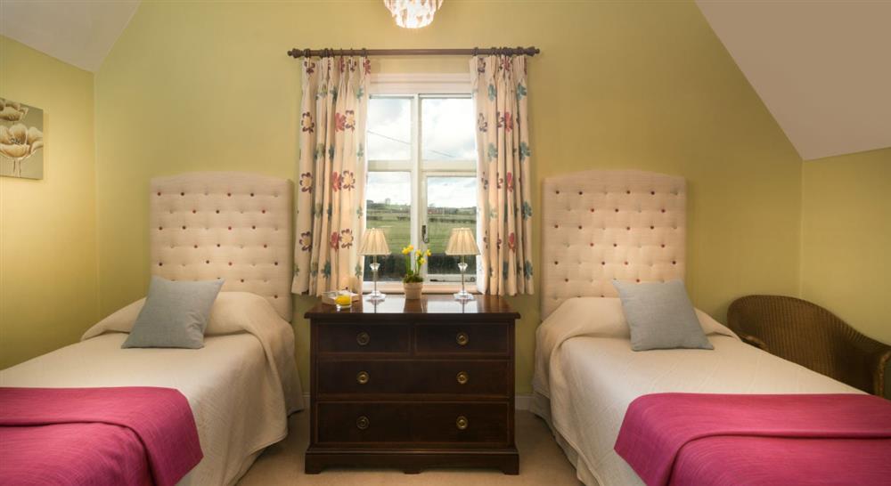 The twin bedroom at Kedleston Park House in Derby, Derbyshire