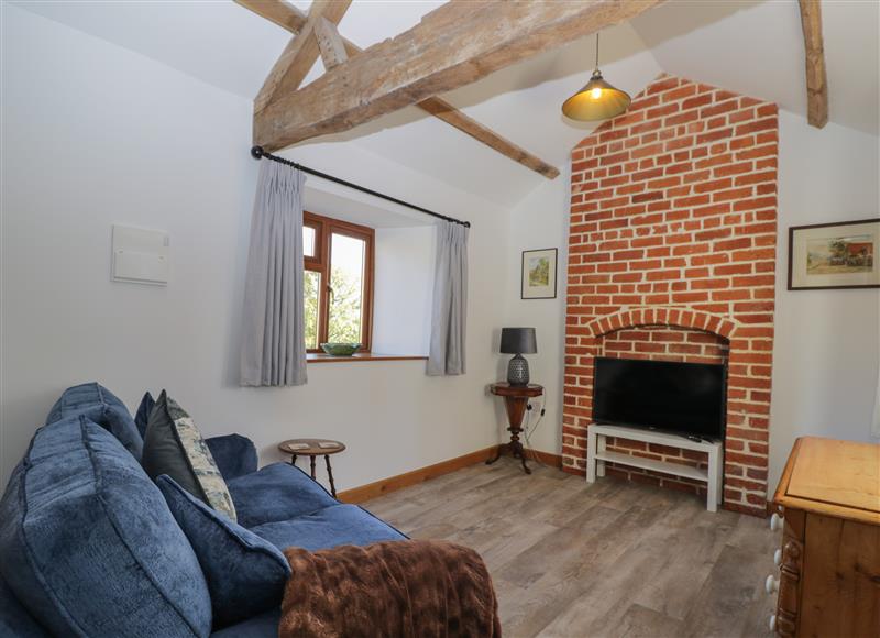 Relax in the living area at Keepers Barn, Bromyard