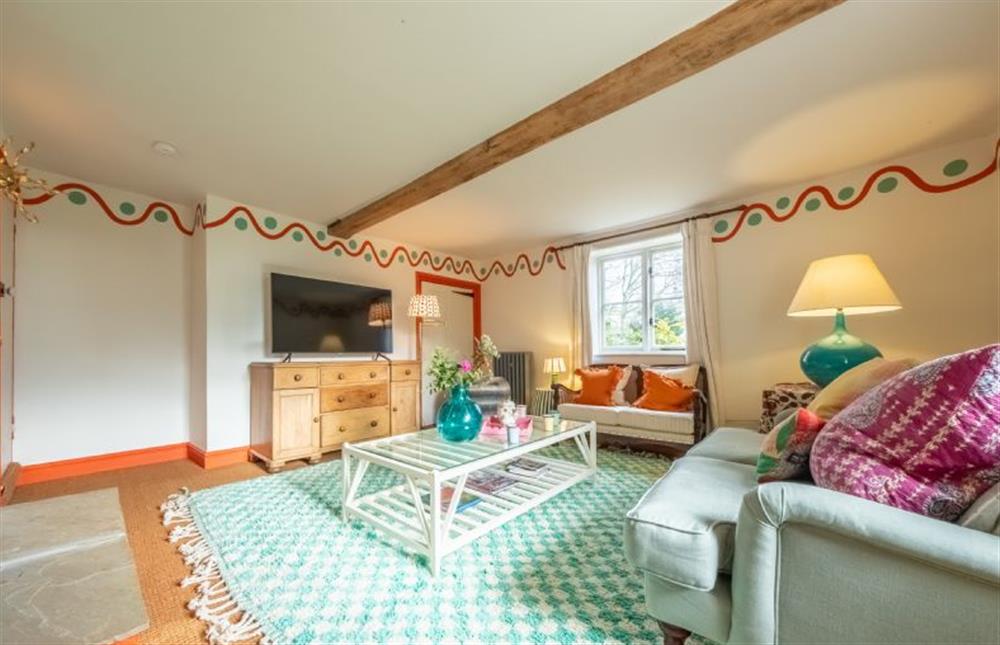 Relax in the playful interiors of the snug  at Keepers Cottage, Aylsham