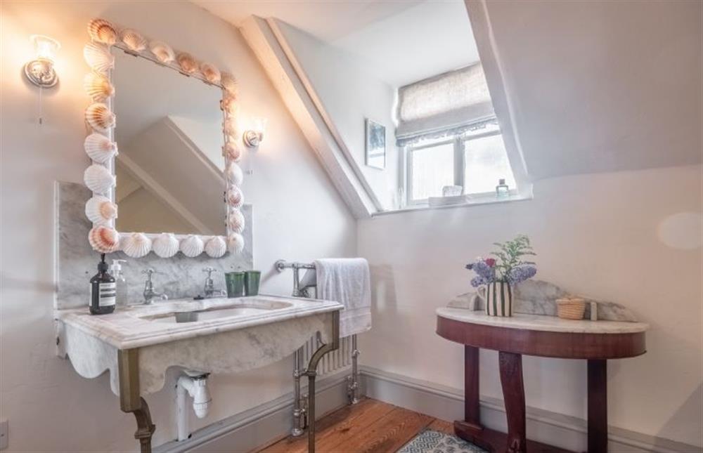 The pretty family bathroom  at Keepers Cottage, Aylsham