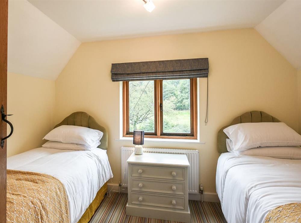 Twin bedroom at Keepers Cottage in Betchcott, near Church Stretton, Shropshire