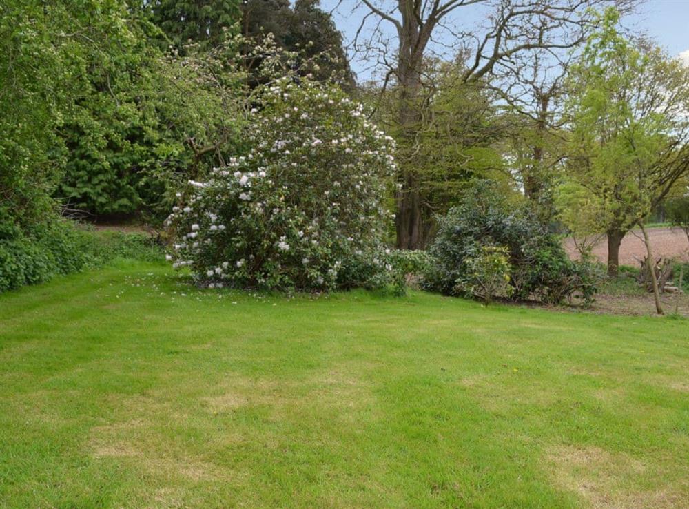 Large private lawned garden at Keepers Cottage in East Beckham, near Sheringham, Norfolk