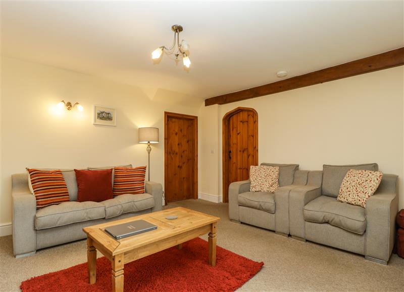 Relax in the living area at Keepers Cottage, Shobdon