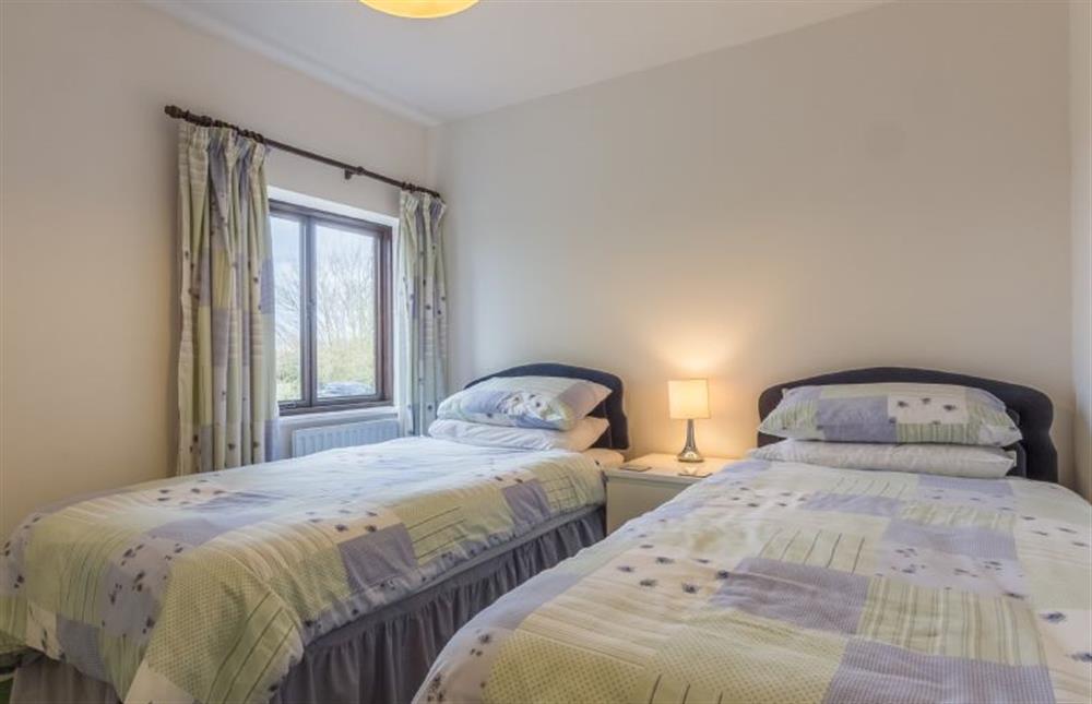 First floor: Bedroom three is a sweet little twin room at Keepers Cottage, West Barsham near Fakenham