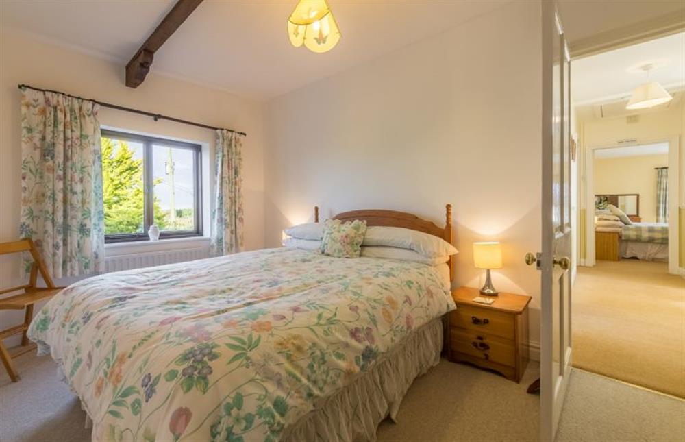 First floor: Bedroom two has a double bed at Keepers Cottage, West Barsham near Fakenham