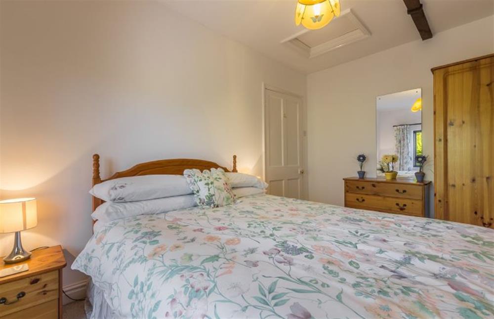 First floor: Double bed in bedroom two at Keepers Cottage, West Barsham near Fakenham