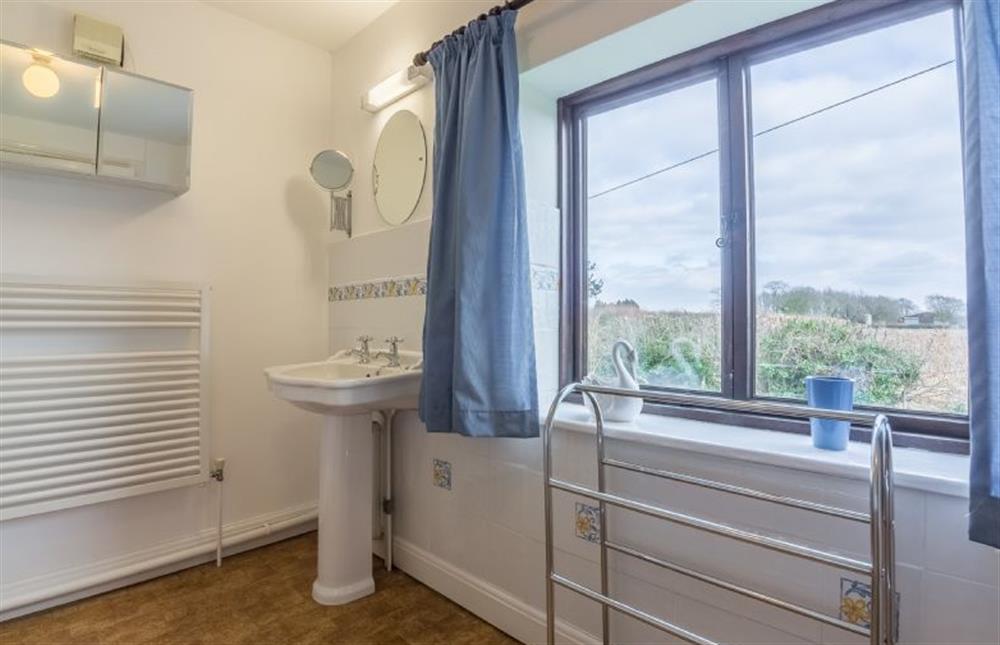 First floor: The en-suite bathroom at Keepers Cottage, West Barsham near Fakenham