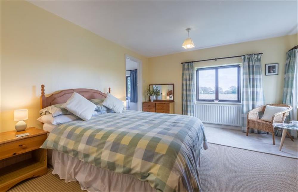 First floor: The spacious master bedroom  at Keepers Cottage, West Barsham near Fakenham