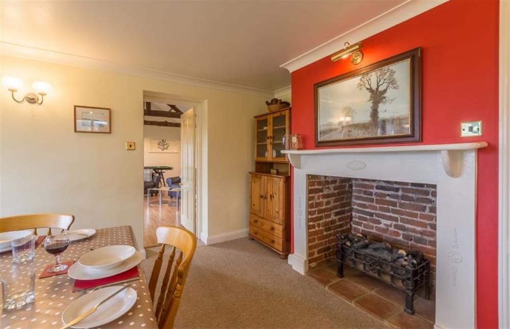 Ground floor: Ornamental fireplace in the dining room at Keepers Cottage, West Barsham near Fakenham