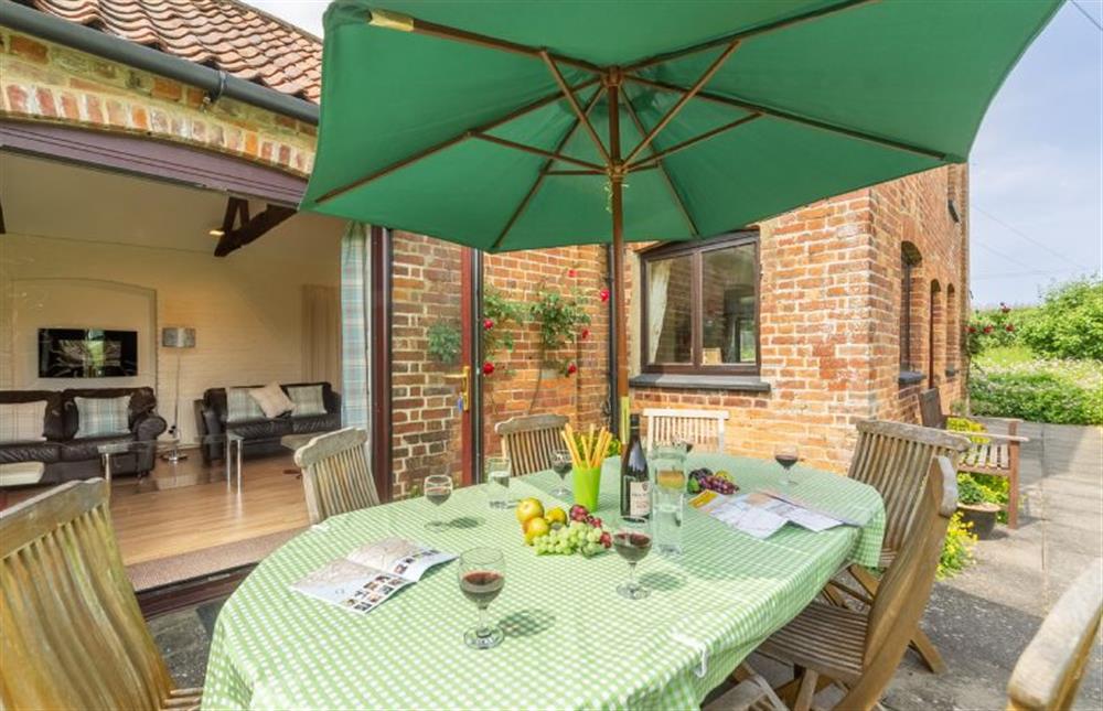 The patio is perfect for dining alfresco at Keepers Cottage, West Barsham near Fakenham