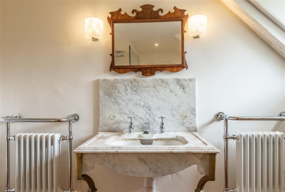 Beautiful marble wash basin in the family bathroom at Keepers Cottage, Wolterton