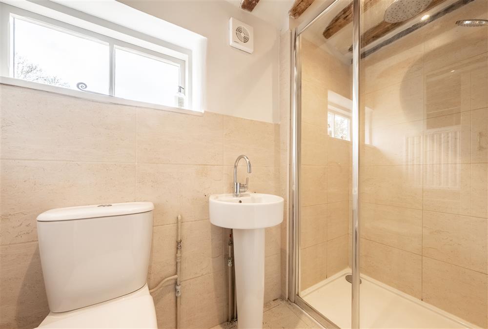 En-suite shower room with walk-in shower, wash basin and WC at Keepers Cottage, Wolterton