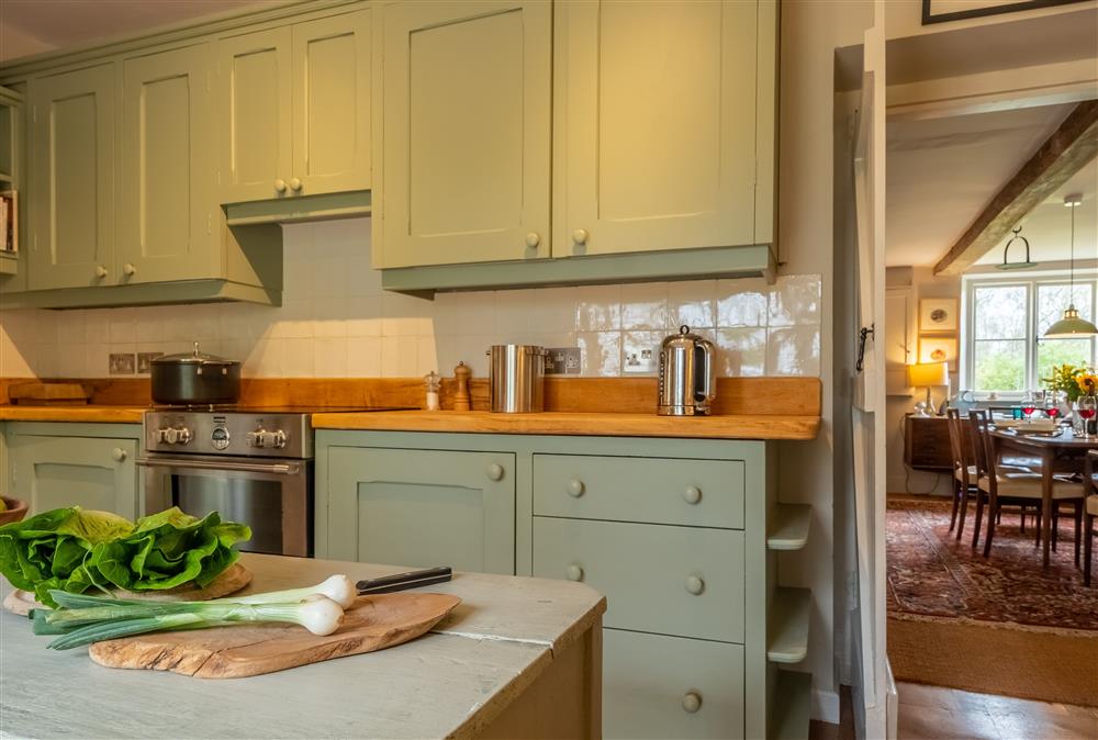 The kitchen leads on from the dining room at Keepers Cottage, Wolterton