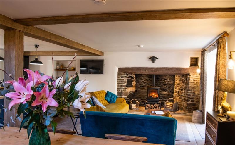 Relax in the living area at Keepers Lodge, Knowstone