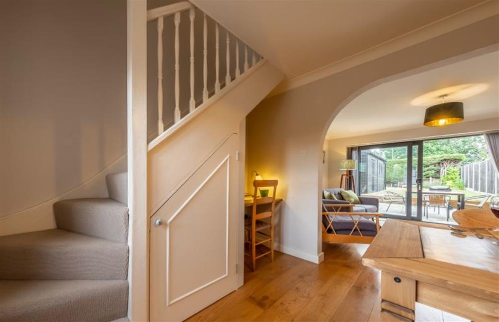 Stairs lead up from the dining area at Ken Hill Cottage, Snettisham near Kings Lynn