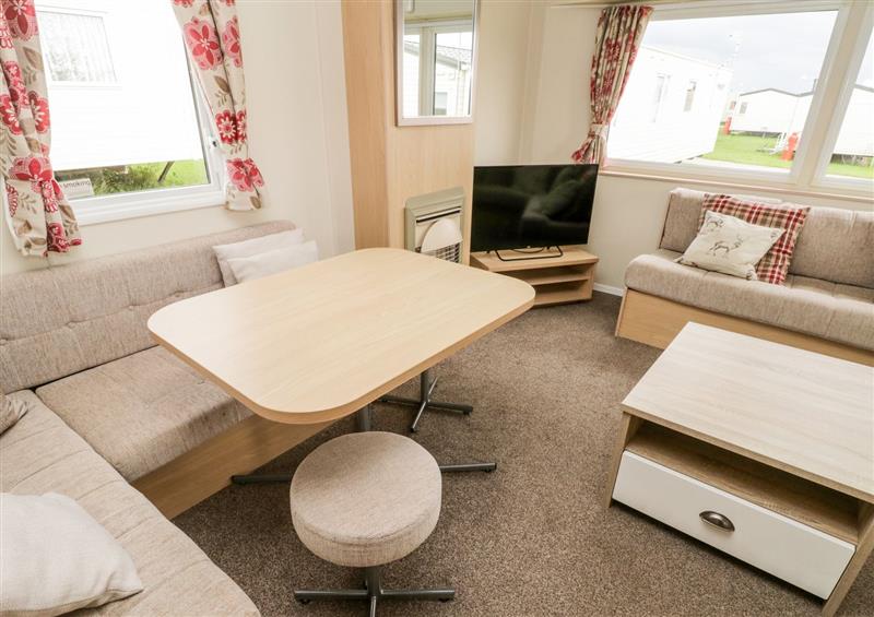 Relax in the living area at Kestrel 7, Cayton Bay near Cayton