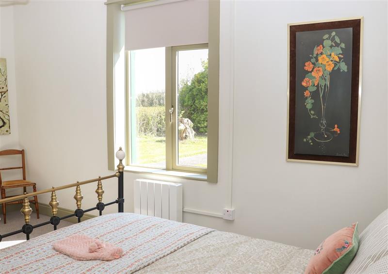 One of the 2 bedrooms (photo 2) at Kevins Cottage, Ballymacoda
