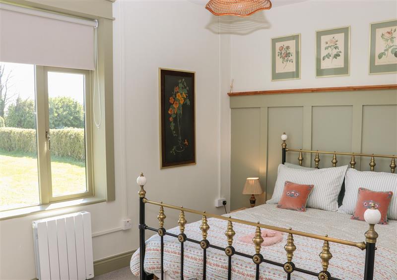This is a bedroom at Kevins Cottage, Ballymacoda