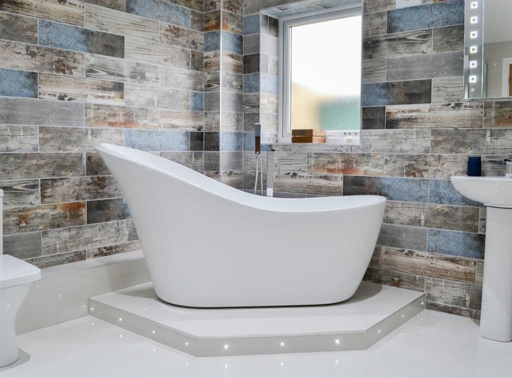 Freestanding bathtub in the contemporary bathroom at Key to the Esk in Longtown, near Carlisle, Cumbria