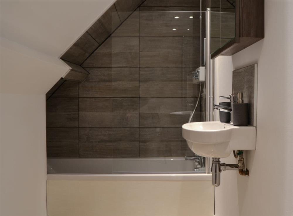 Bathroom with shower over bath at Kia Rosa in Ryde, Isle of Wight