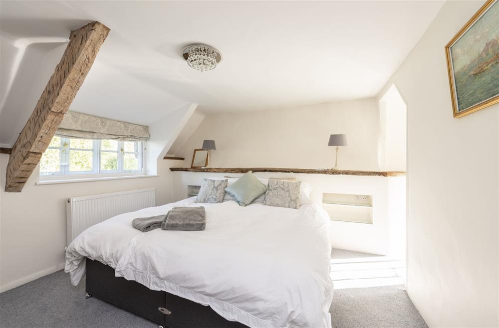 Bedroom two with super-king size bed at Kiddles House, Piddletrenthide, nr Dorchester