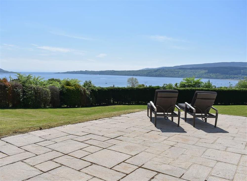 Paved terrace and seating from which to admire the view at Kilbride House in Lamlash, Isle of Arran, Scotland