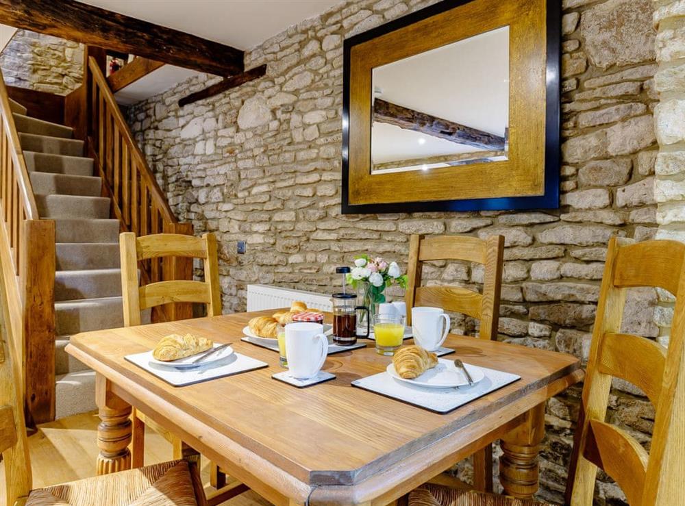 Attractive dining area at Kilcot Coach House in Lower Kilcot, near Wotton-under-Edge, Gloucestershire