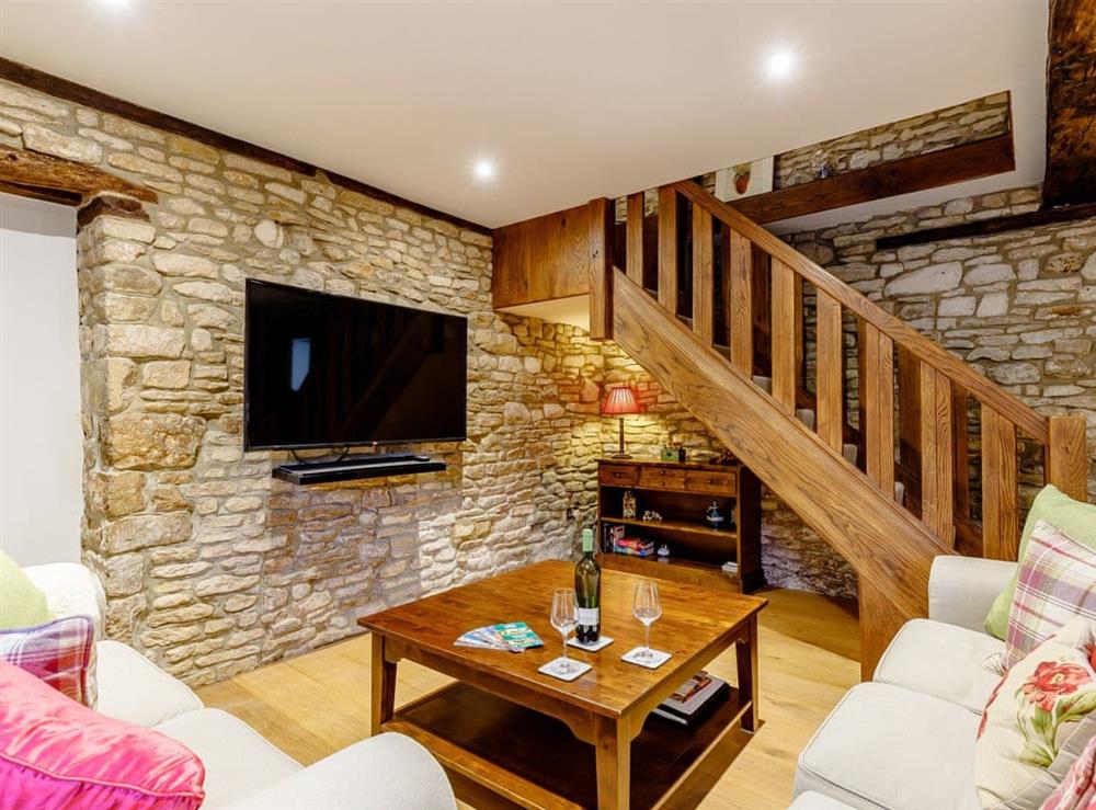 Welcoming living area at Kilcot Coach House in Lower Kilcot, near Wotton-under-Edge, Gloucestershire