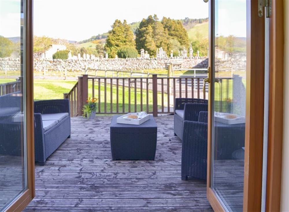 Decked area overlooking the garden at Kilmore House in Drumnadrochit, near Inverness, Inverness-Shire