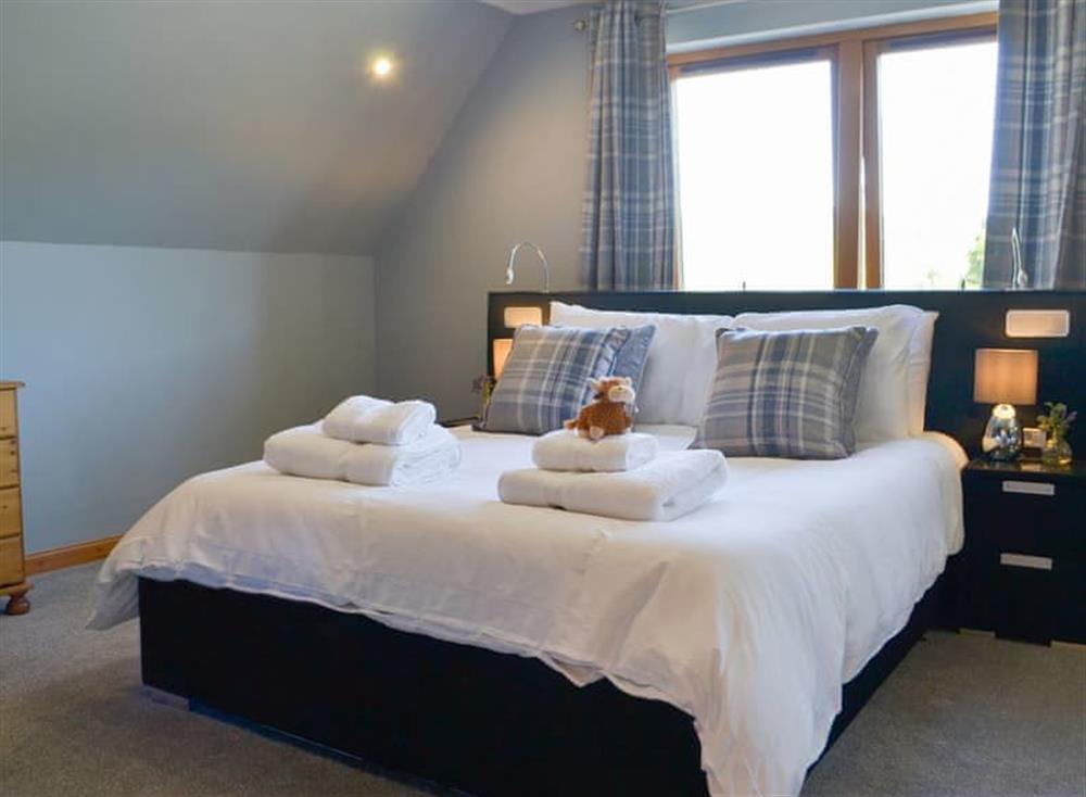 Double bedroom with sloping ceilings at Kilmore House in Drumnadrochit, near Inverness, Inverness-Shire