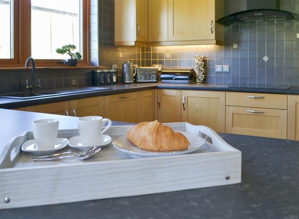 Well appointed kitchen with breakfast bar at Kilmore House in Drumnadrochit, near Inverness, Inverness-Shire