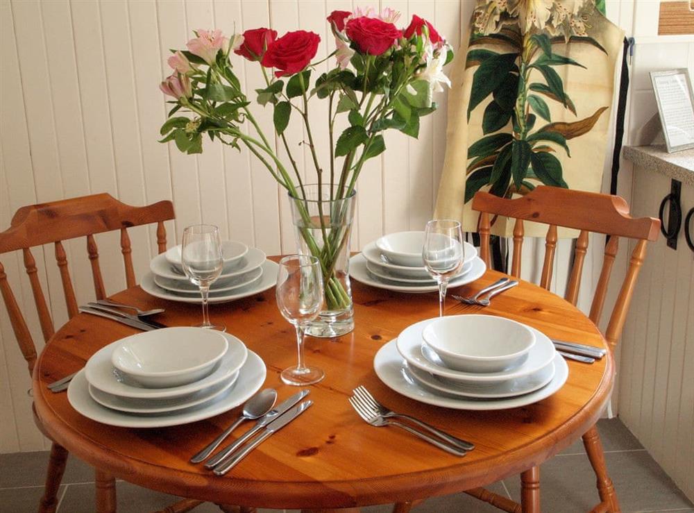 Dining table set for four at Kiln House in Keltneyburn, near Aberfeldy, Perthshire