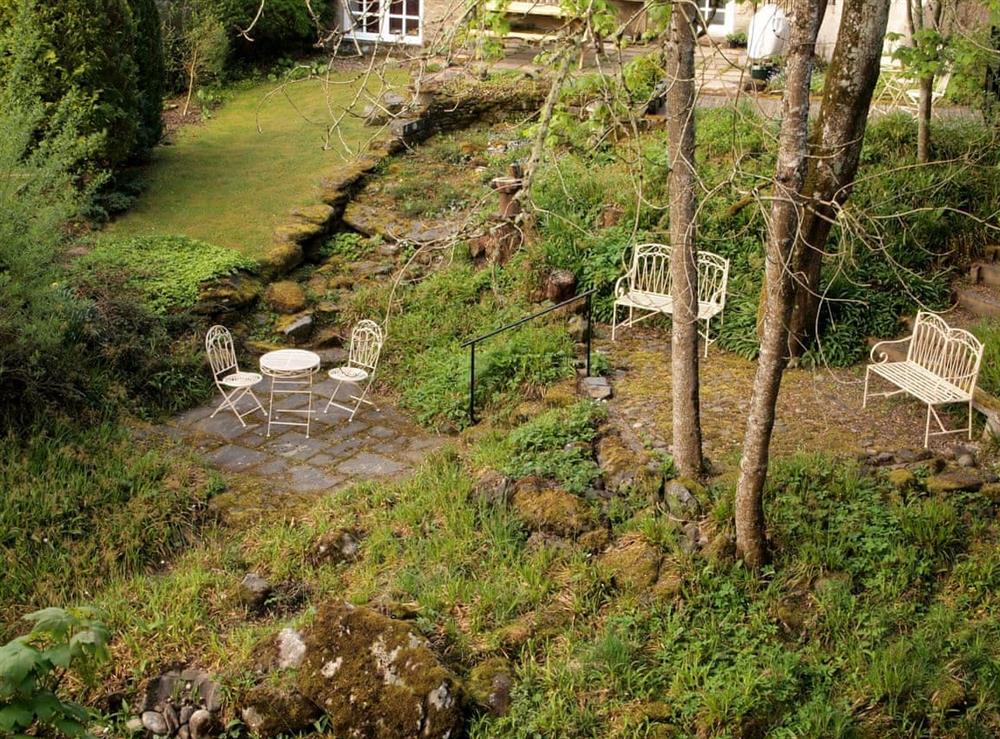 Garden terraces with seating areas at Kiln House in Keltneyburn, near Aberfeldy, Perthshire